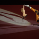 US Snowboarder Amy Purdy dances with a robot arm. (OIS/IOC/Robert Martin)